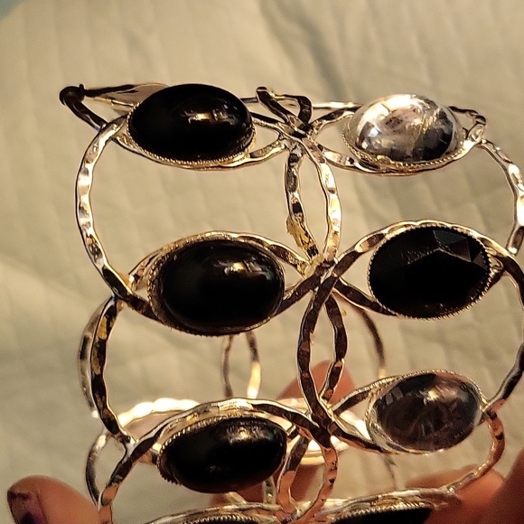 White House Black Market Gold and Black Bracelet
Wore 1 x. - Picture 3 of 7